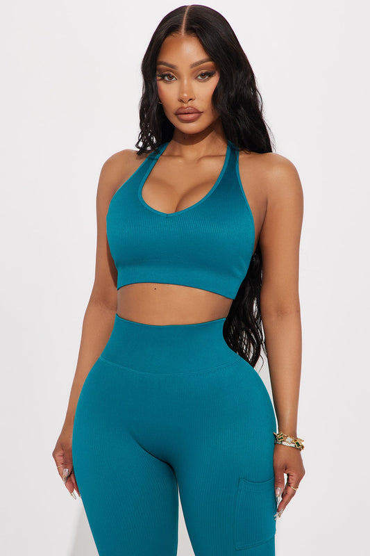 https://cdn.shopify.com/s/files/1/0293/9277/files/04-22-24_S2_33_ZDSP2305SET_Teal_P_KJ_RL_15-19-45_16964_PXF.jpg?v=1713999502