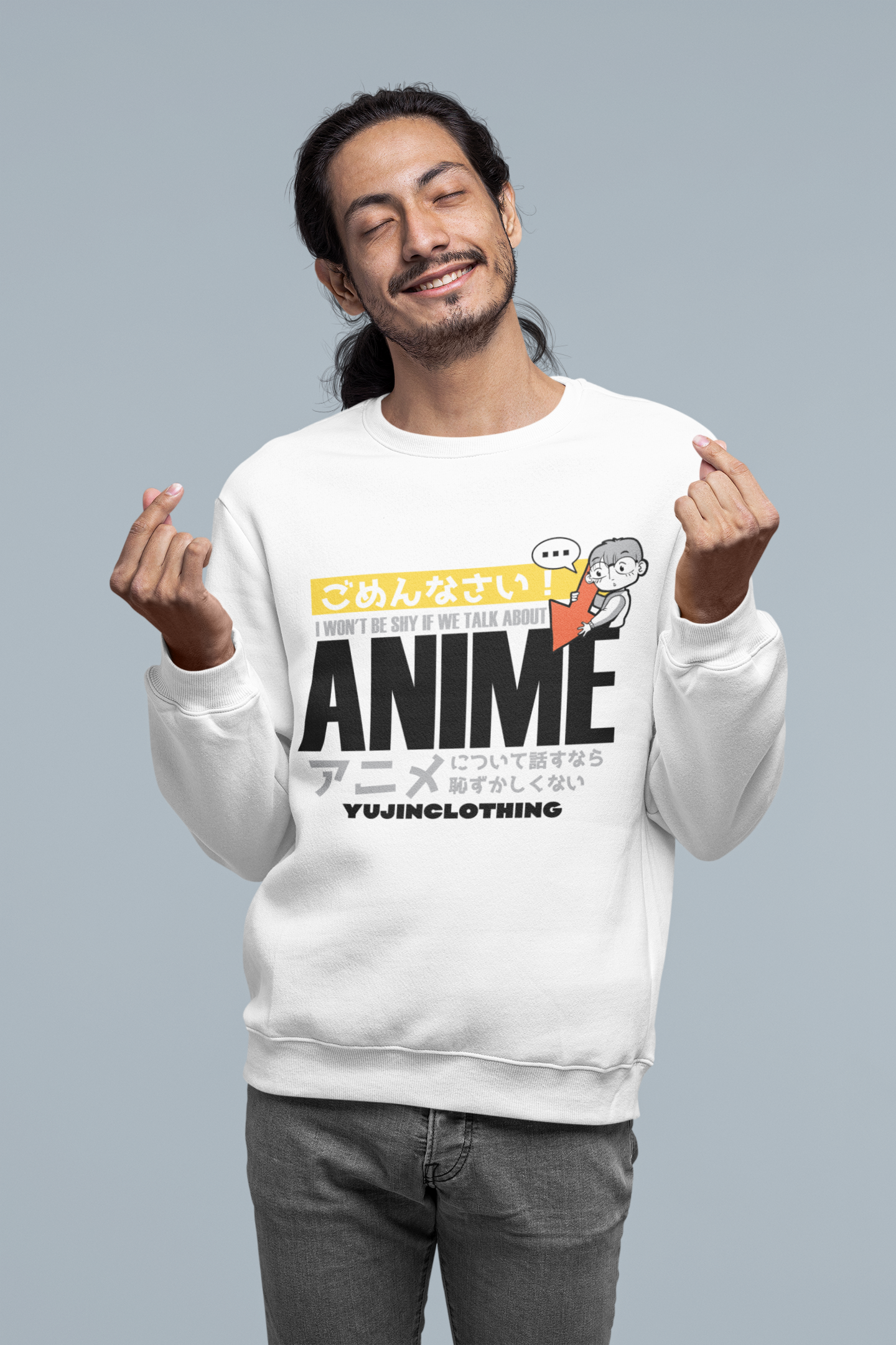 Person wearing a white sweatshirt with 'Anime' text and graphics on a gray background